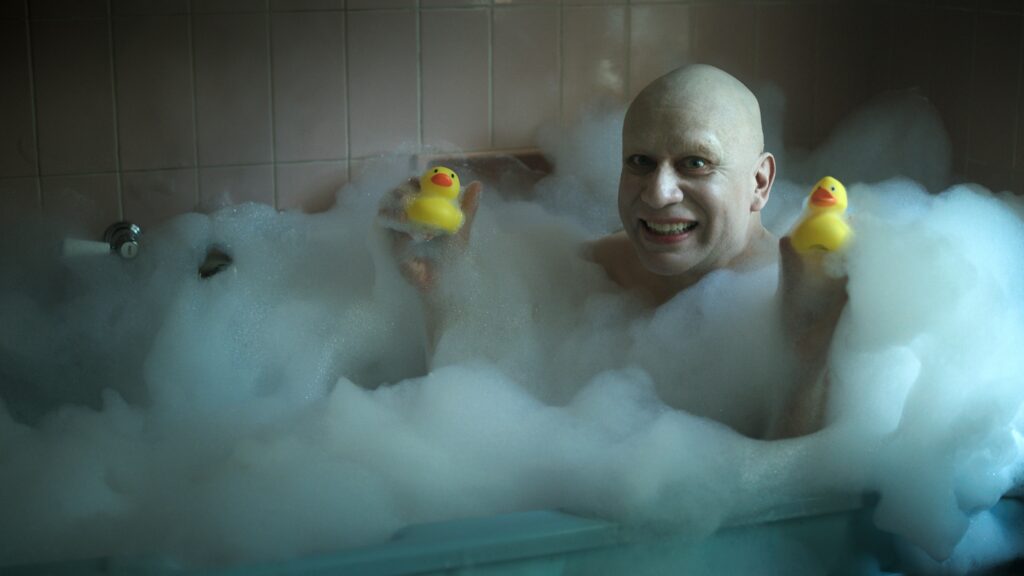 Wednesday. Fred Armisen as Uncle Fester in episode 204 of Wednesday. Cr. Courtesy of Netflix © 2025